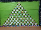 Our christmas tree for the world we dream of. Its made from many little angels with a different word-wish written on them: Love, Peace, Cooperation, Giving, Happiness, Presents, Sweets, Flowers ...